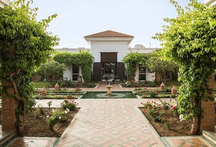 Maximum Golfreise Webseite mit Robinson Club Agadir und Hotelbild mit Springbrunnen und Garten