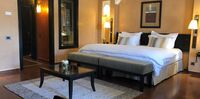 Maximum Golfreisen, Marokko/Agadir, Tikida Golf Palace-das Zimmer mit Möbeln und das Bett
